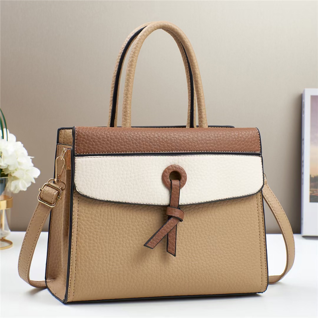 The new color-blocking handbag for foreign trade is a versatile single-shoulder tote bag with a fashionable color contrast and a high-end feel. It is a trendy crossbody bag with a patchwork design Application Scenario