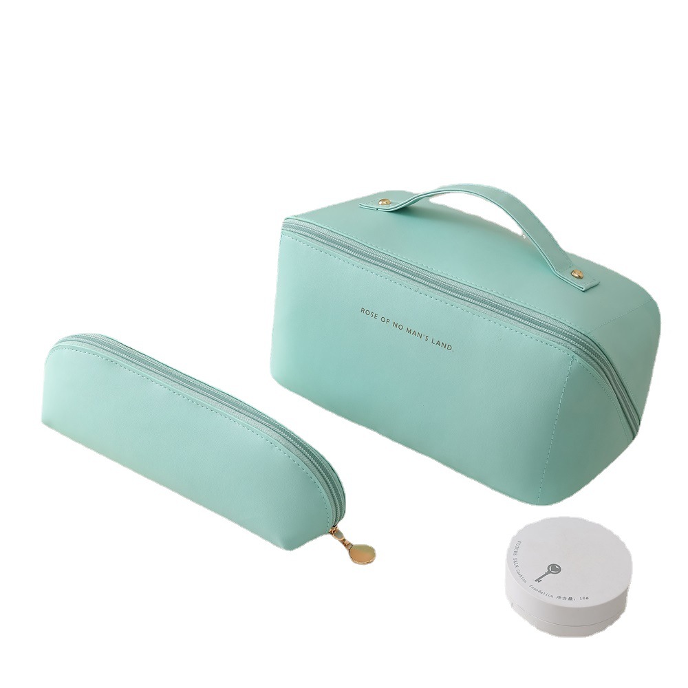 New cloud pillow makeup bag, organ bag for women, large-capacity travel storage bag, portable hand-held pu waterproof wholesale Item Picture