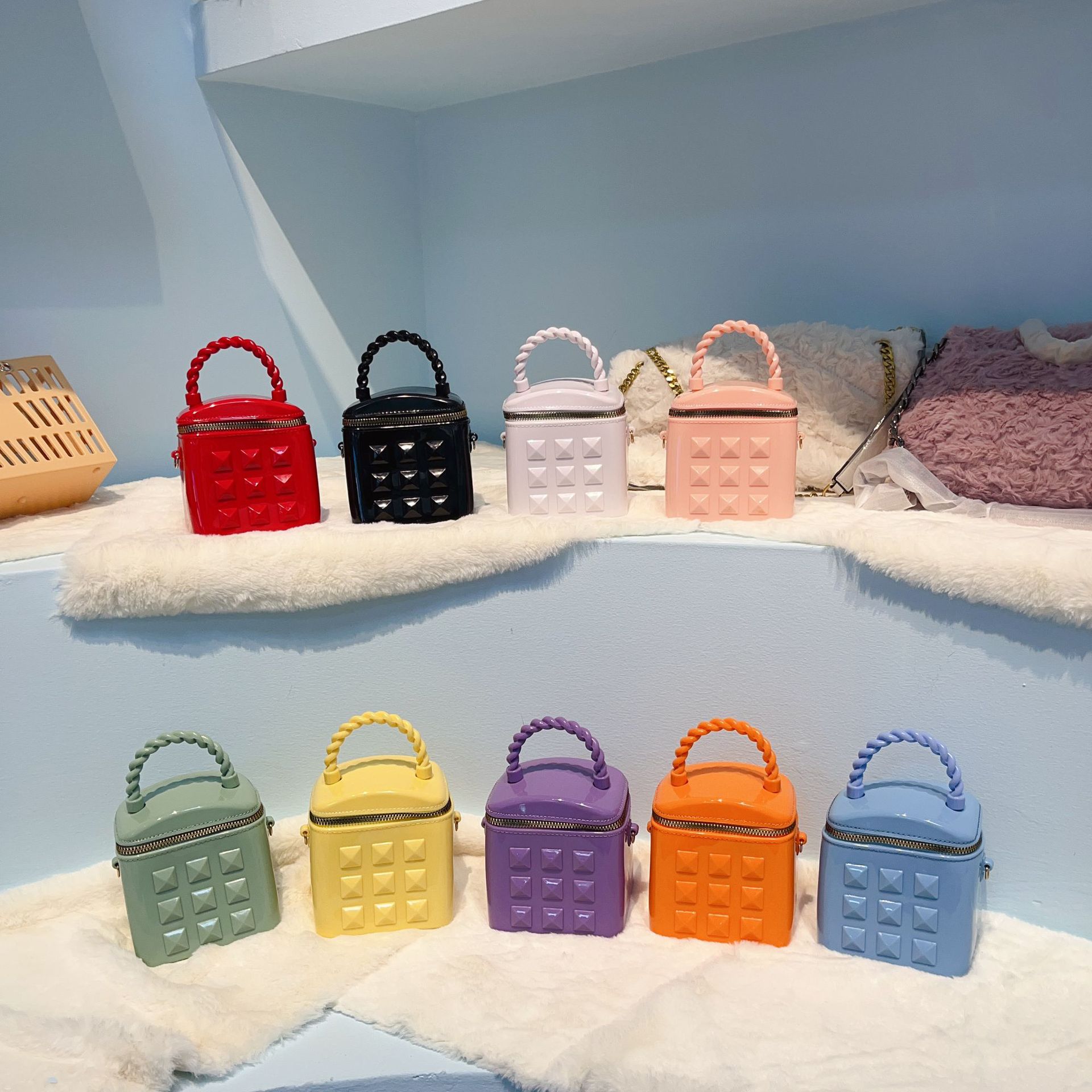 2025 Summer New Fashion mini rivet bucket bag, jelly bag, single-shoulder crossbody chain hand-held women's bag full figure