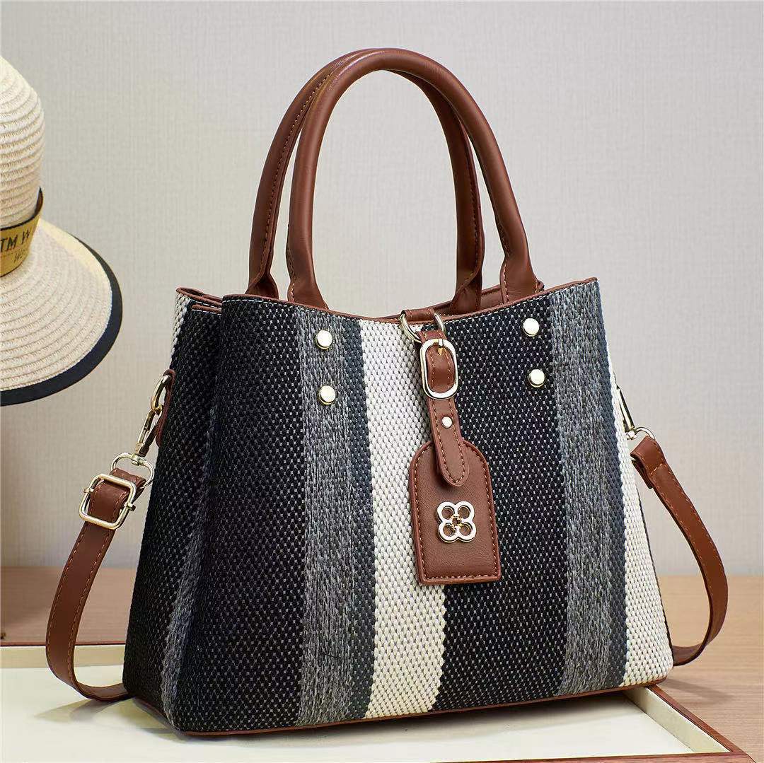 The 2023 new hand-held crossbody single-shoulder bag for foreign trade women is a fashionable cross-border bag with woven and embossed patterns. It has a large capacity and contrasting colors Application Scenario