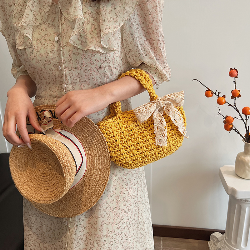 Summer straw woven bag, women's stylish bow hand-held bucket bag, trendy silk scarf, beach vacation woven bag details Picture