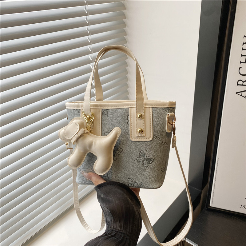 Hand-held fashionable bow bucket bag for women, summer 2025, Korean style, simple and versatile single-shoulder bag, high-end crossbody bag full figure