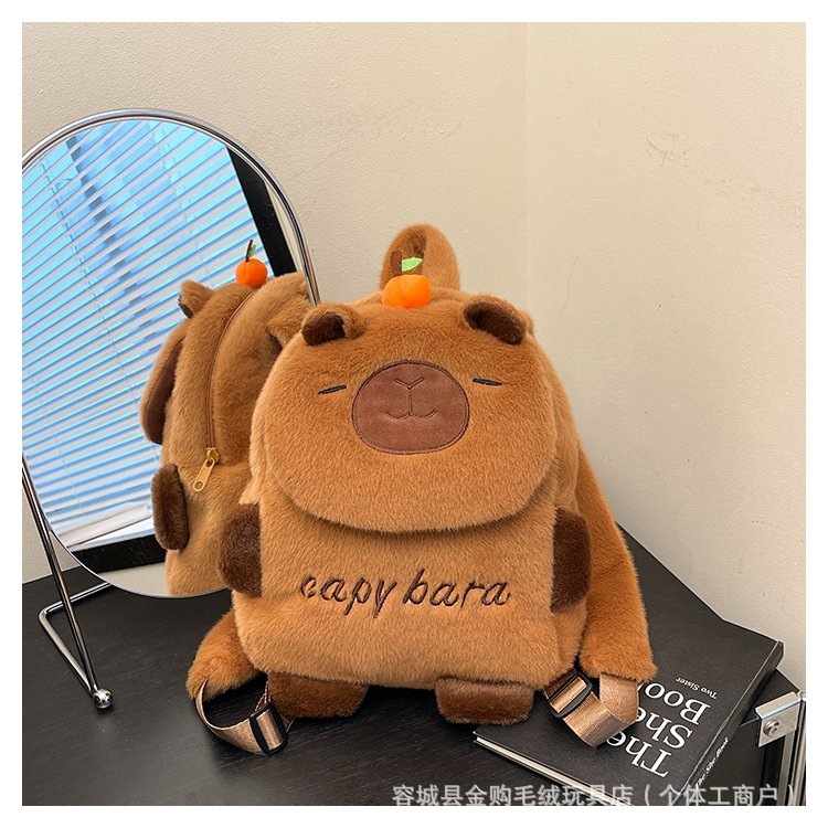 The new cute Capibara backpack features a high level of appearance and cartoon versatility. It's a student bag for girls and an ugly and cute capybara plush bag full figure