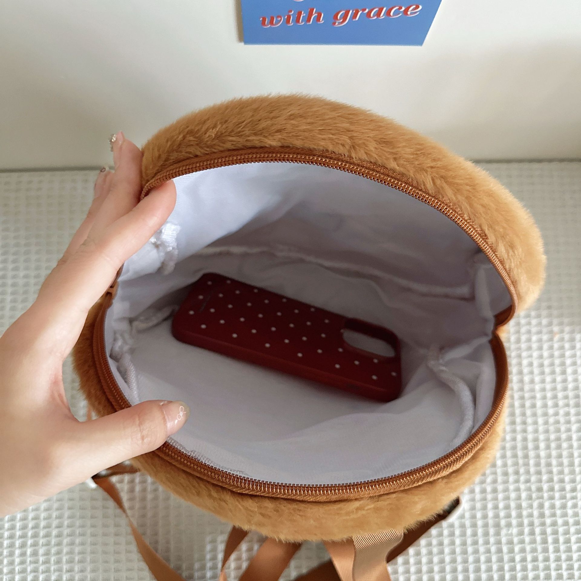 The new Capibara small round bag is a cute and playful student backpack with large capacity and embroidery Application Scenario