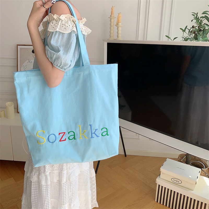 35246 canvas bag, summer embroidered letter, large capacity tote, ins, student book, class bag, hand-held Application Scenario
