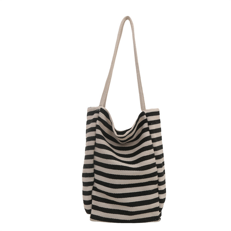 Korean-style artistic striped canvas bag 2024, casual, simple, large-capacity, laid-back style rope hand-held shoulder tote bag Item Picture
