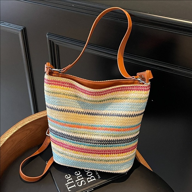 New bucket bag, niche woven bag, striped single-shoulder bag, trendy underarm bag, fashionable straw woven bag, hand-held crossbody bag full figure