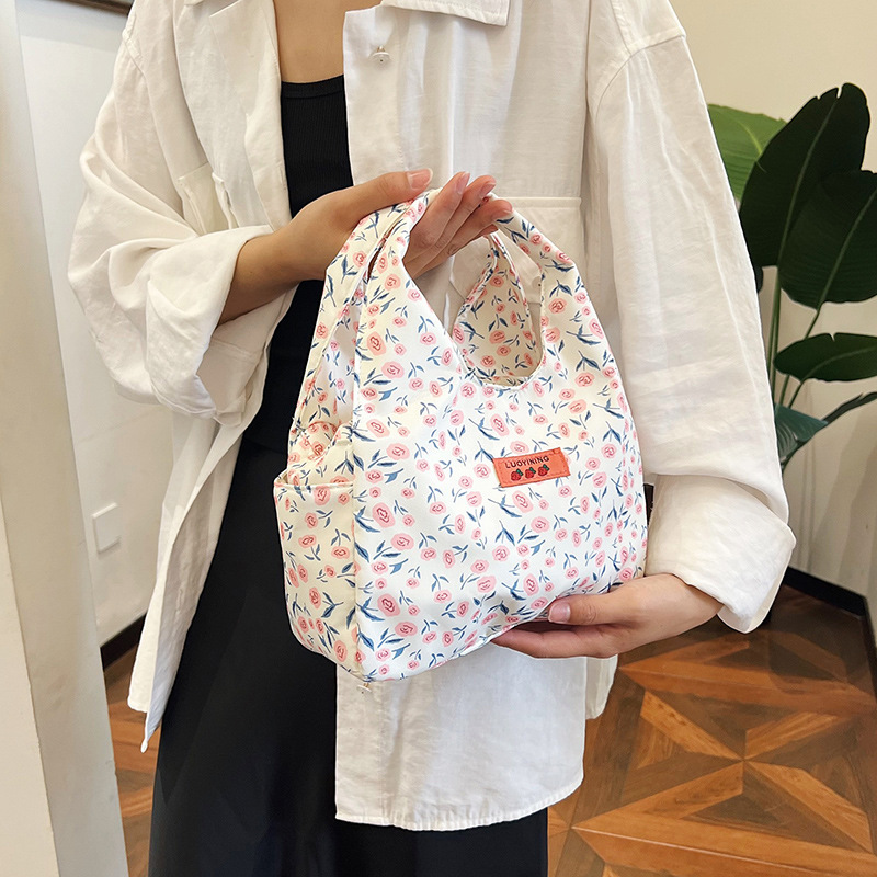 Fresh and delicate floral hand-held canvas bag 2025 new style large-capacity casual women's bag, versatile hand-held tote bag wholesale details Picture