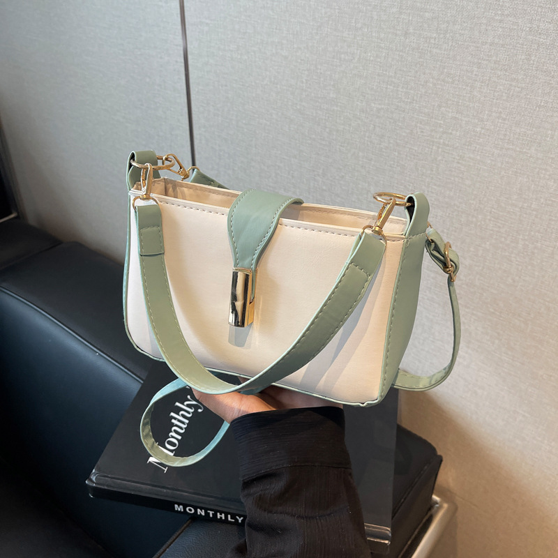 The new color contrast and patchwork women's bag for the 2024 autumn and winter season features a unique and high-quality design with a simple single-shoulder crossbody style, creating a cross-border trend full figure