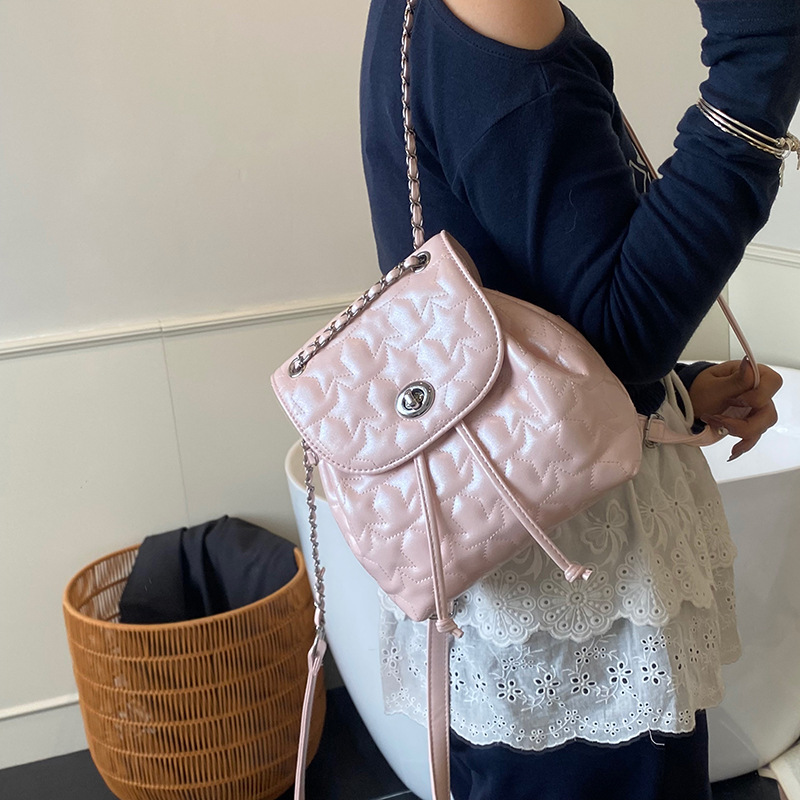 A high-end and fashionable small backpack for women in 2025, with a niche design and a chanel-style chain backpack for women details Picture