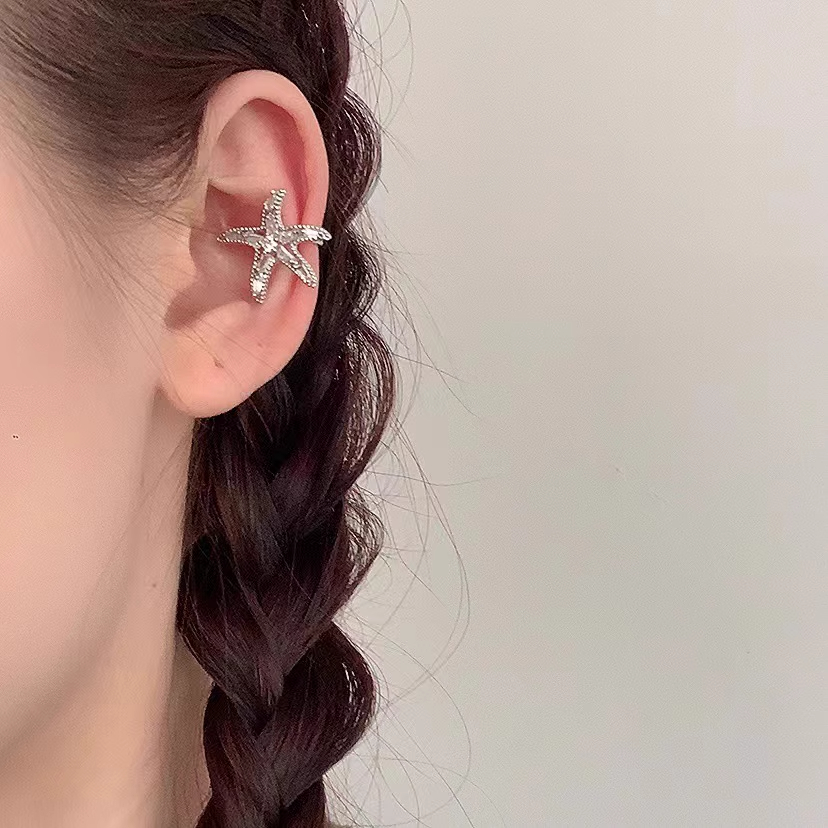 Xuhui brand exquisite and light luxury copper plated with real gold and zirconia 925 silver needle starfish stud earrings, fashionable and elegant full figure