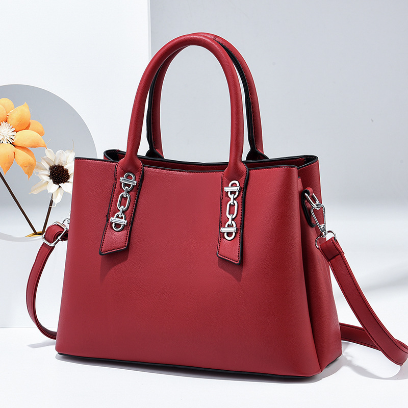 The 2025 new color-blocking women's bag is a streetwear, fashionable and simple women's hand-held shoulder bag details Picture