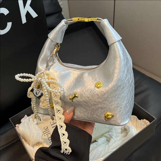 Korean style simple and fashionable baguette bag for women 2025 new style, sweet and stylish bow single-shoulder crossbody bag full figure