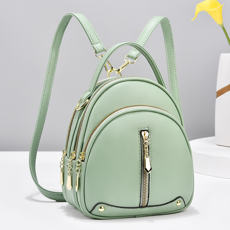 The 2024 new stylish Korean-style trendy small backpack is simple and elegant. It features a single-shoulder crossbody small round bag and a double-shoulder women's bag Specification drawing