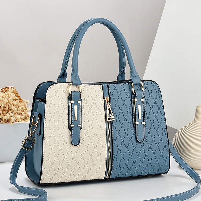 A best-selling new women's 2024 single-shoulder crossbody bag from a large bag manufacturer. It's a summer versatile hand-carry fashion for export full figure