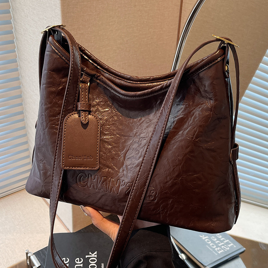 Retro and fashionable pleated bucket bag 2024 new style simple and casual single-shoulder bag Korean-style niche high-end crossbody bag full figure