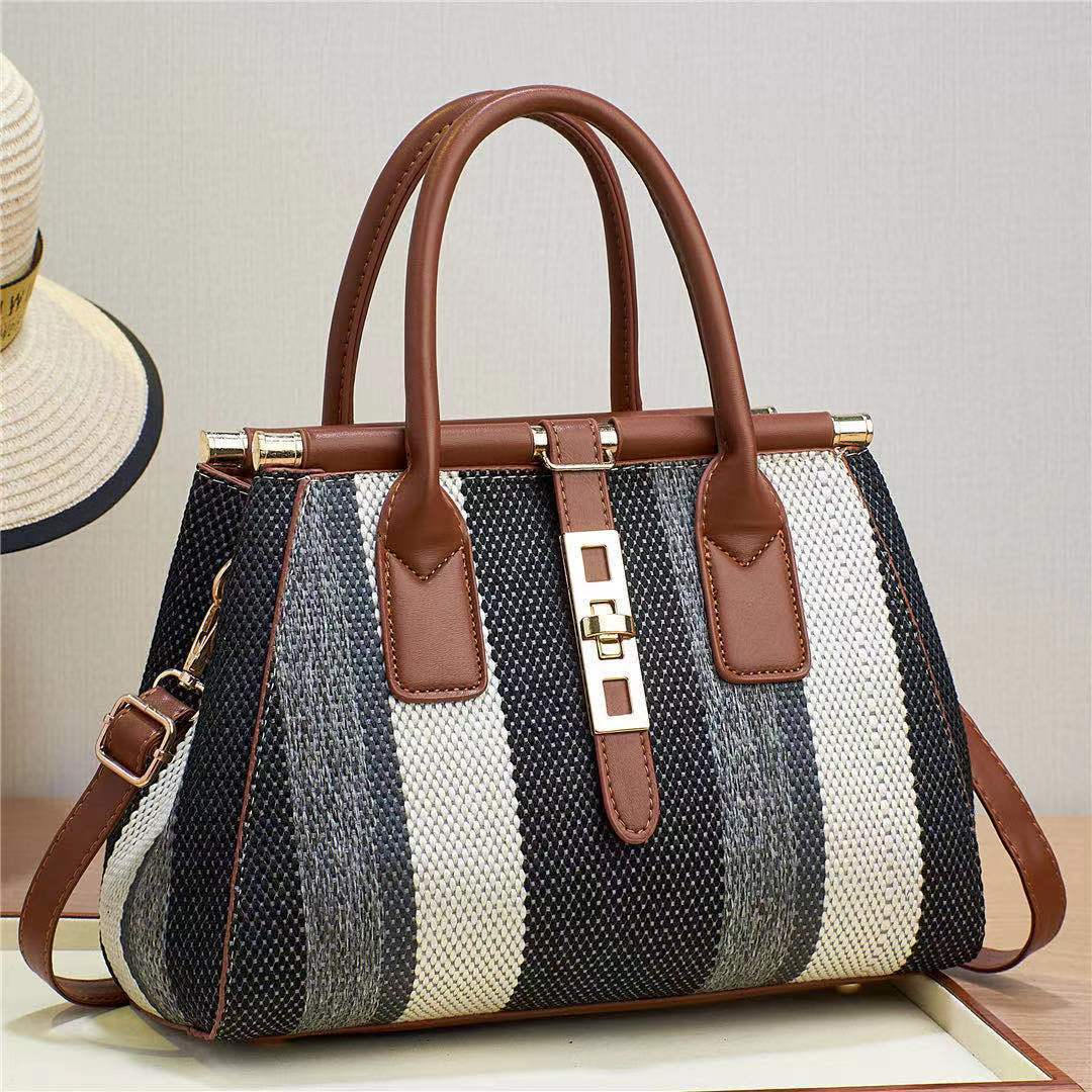 The 2023 new style of women's bag made of faux woven canvas material is noble and fashionable, with contrasting colors. It is a large-capacity cross-border bag for single-shoulder, crossbody and hand-carry Specification drawing