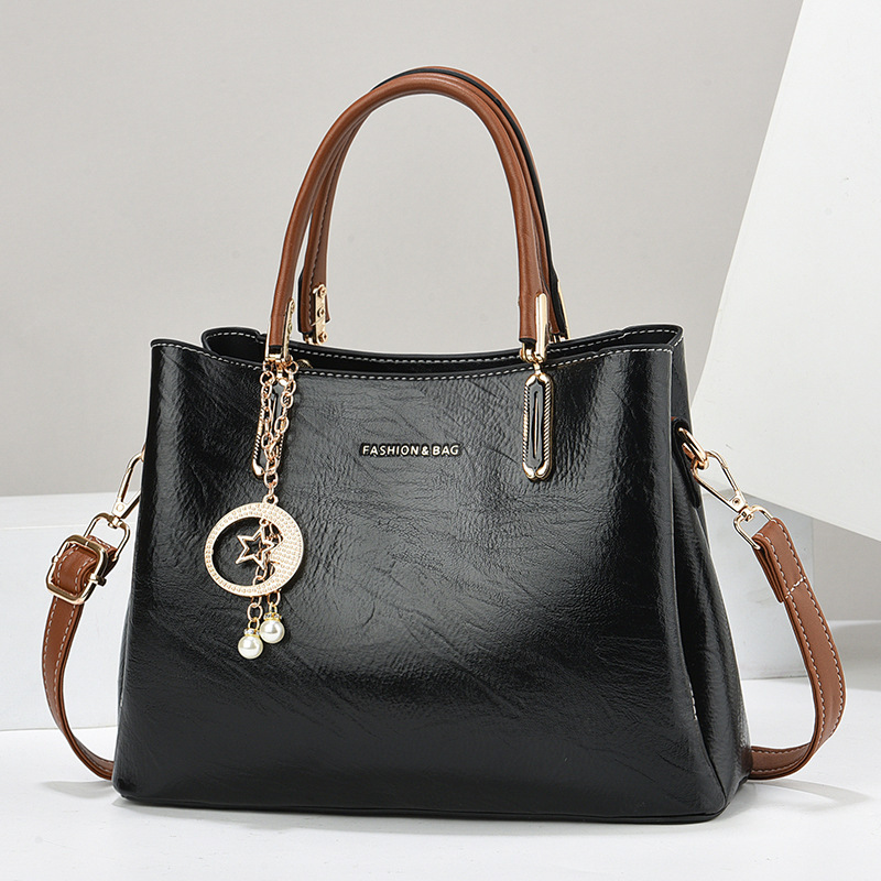 New trendy, simple and large-capacity bag for women, a retro and fashionable cross-border handbag, a high-end and versatile commuter tote bag full figure