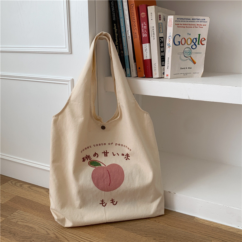 【 In Stock 】1552 canvas bag for Girls, a fresh and cute peach-printed single-shoulder bag, a Japanese college student schoolbag Item Picture