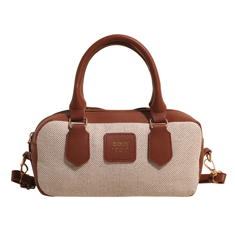 A niche color-blocking bowling bag for women, a new 2025 high-end canvas handbag, a retro single-shoulder crossbody bag Item Picture