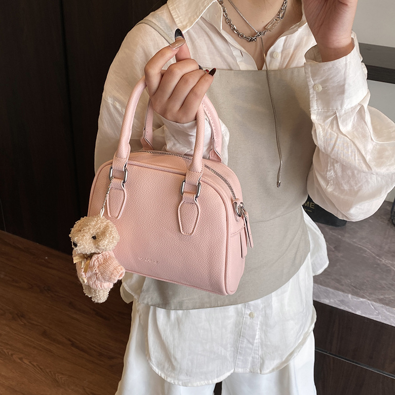 Korean style simple and fashionable hand-held bowling bag for women 2025 new high-end soft leather single-shoulder crossbody bag details Picture
