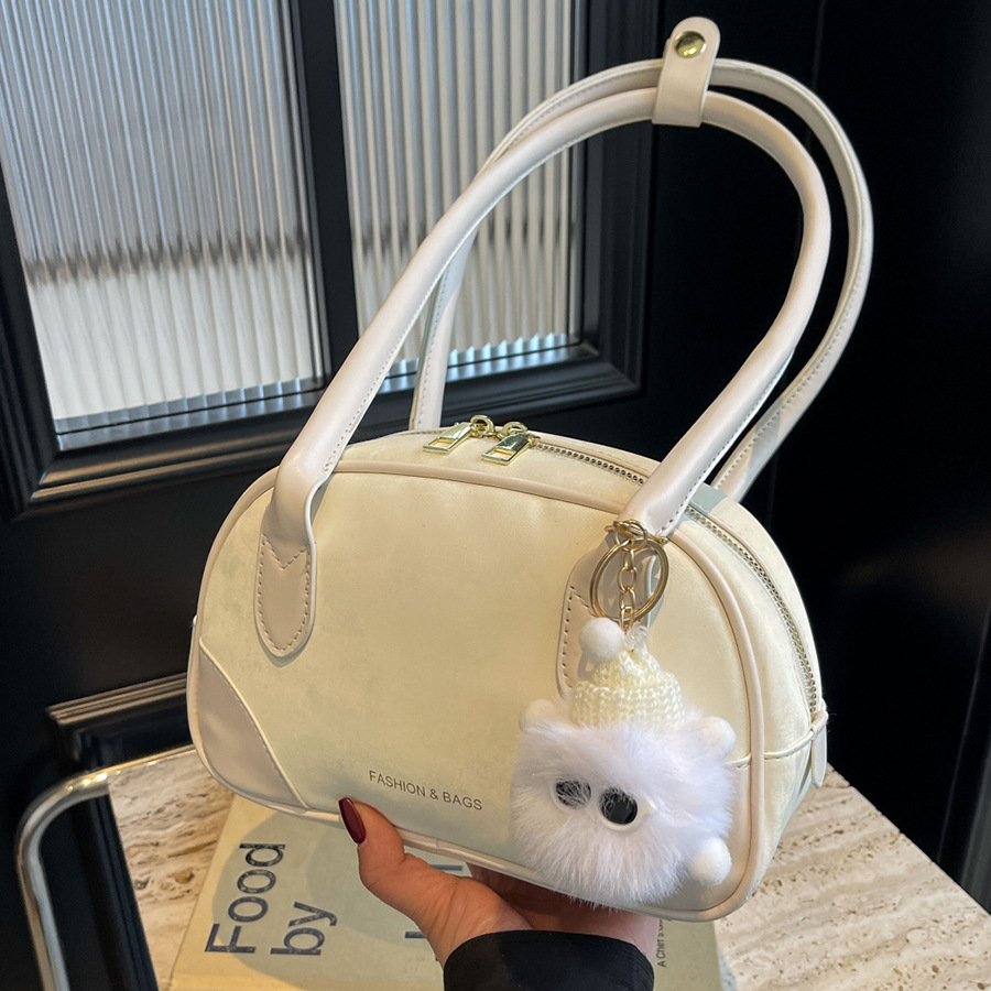 Korean niche design hand-held bowling bag 2024 new style, fashionable and high-end shoulder bag, versatile underarm bag full figure