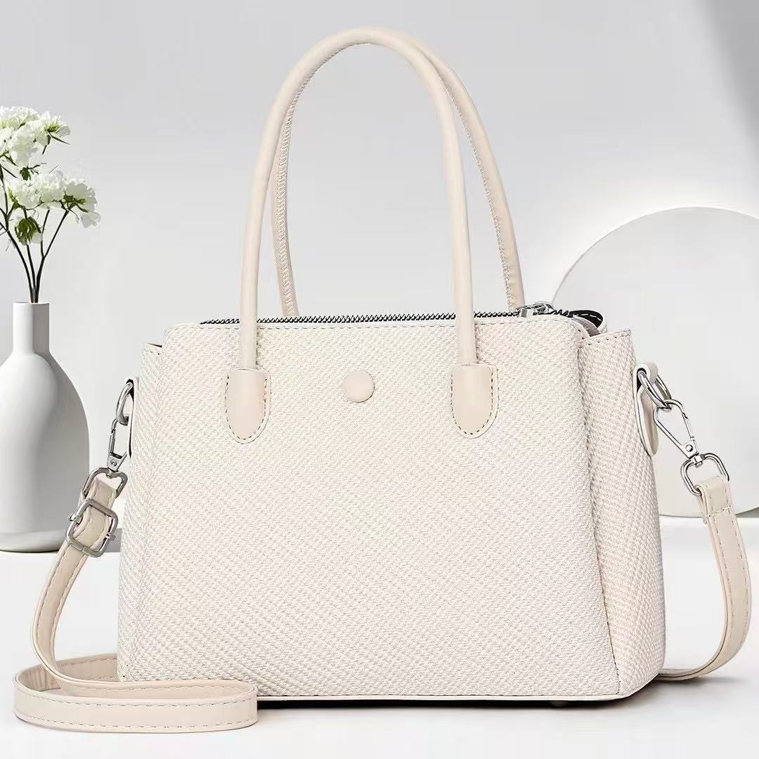 The 2025 new Senmeng women's tote bag features a retro and niche design. It is a small single-shoulder, crossbody, hand-carry bag for work Application Scenario
