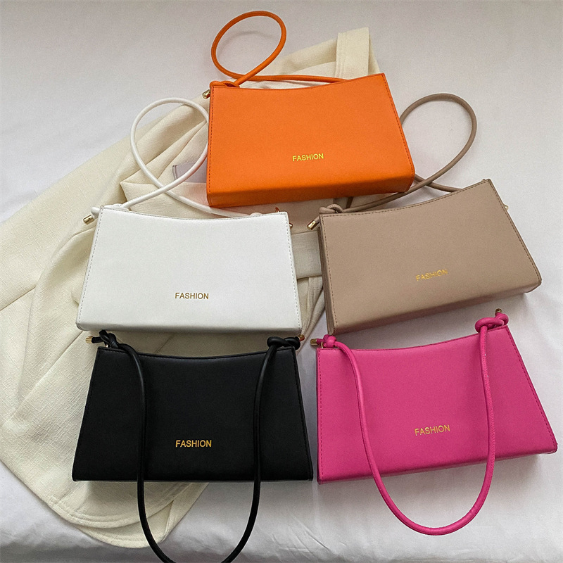 Personalized French candy-colored underarm women's bag 2023 new style, fashionable and simple single-shoulder bag, stylish hand-held baguette bag full figure