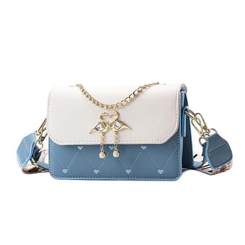 The new exquisite embroidered heart-shaped small square women's bag for autumn and winter is stylish and high-end. It's a one-shoulder crossbody bag with a swan color contrast Item Picture