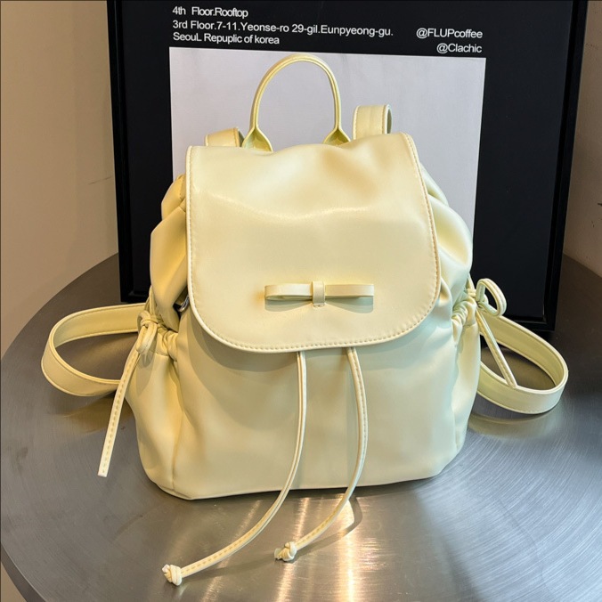The Korean version of the ins fashion solid-color small backpack for women in the summer of 2025 is a versatile, niche and trendy school backpack full figure