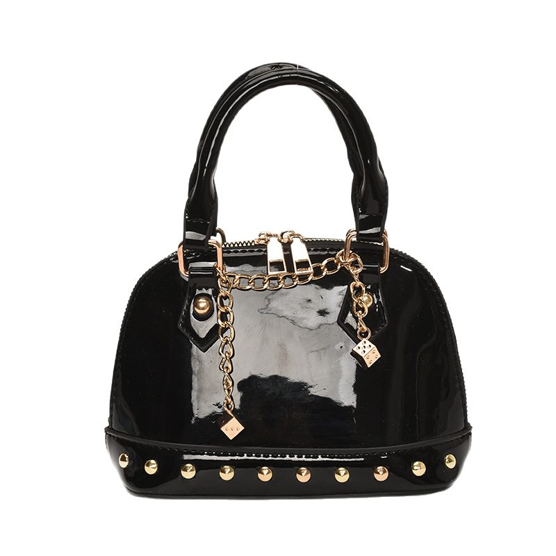 2025 New niche design, high-end rivet hand-held shell bag, fashionable for women, shiny surface, versatile, single-shoulder crossbody bag Item Picture