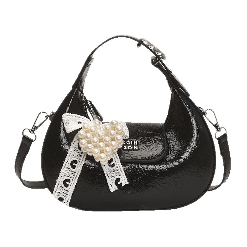 A fashionable, retro, individualistic and simple crescent-shaped bag for women, a new summer 2025 lightweight and niche hand-held commuting single-shoulder crossbody bag Item Picture