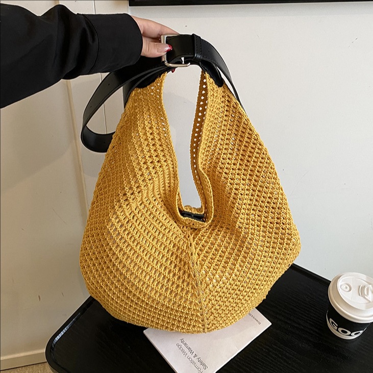 2025 New niche ins hollowed-out patchwork woven bag, summer casual seaside vacation beach single-shoulder armpit bag full figure