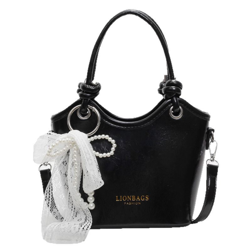 A trendy and fashionable super popular hand-held bucket bag for women in 2025, a new light luxury, niche and high-end commuter single-shoulder crossbody bag Item Picture