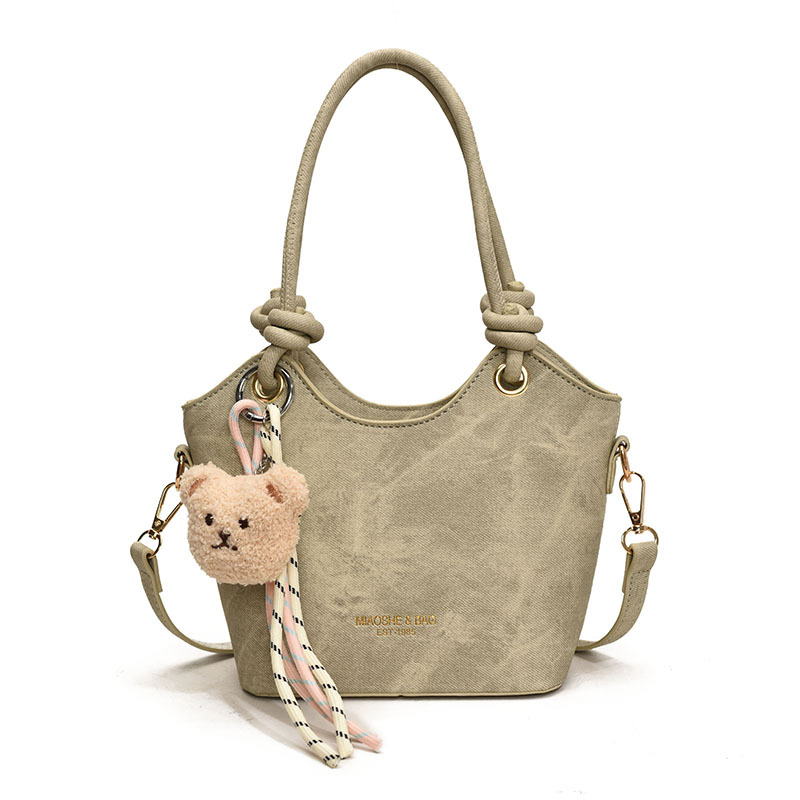 A trendy retro handbag for women, a 2025 new crossbody bucket bag, with a simple and elegant texture and a casual single-shoulder style Item Picture
