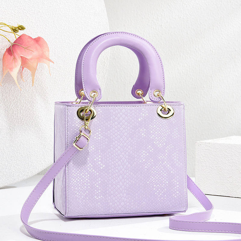 The new high-end silk scarf woven princess bag from Foreign Trade in 2025 features a niche design, a hand-held shoulder crossbody trendy women's bag full figure