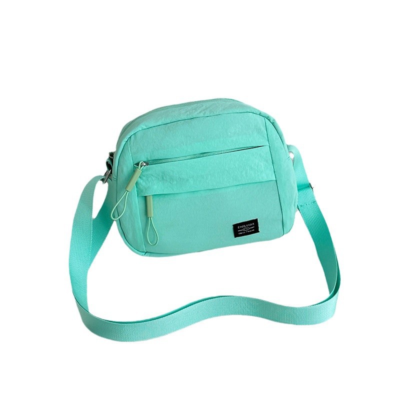 2024 New Korean-style casual and versatile women's crossbody single-shoulder canvas bag, middle-aged and elderly coin purse, solid color trendy women's bag Item Picture
