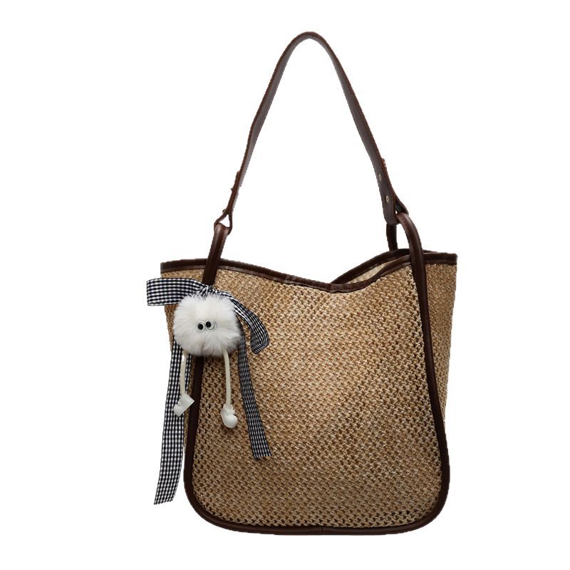 A niche and popular straw-woven bag for women, a new 2025 versatile commuting bag, a fashionable beach vacation large-capacity bucket bag Item Picture