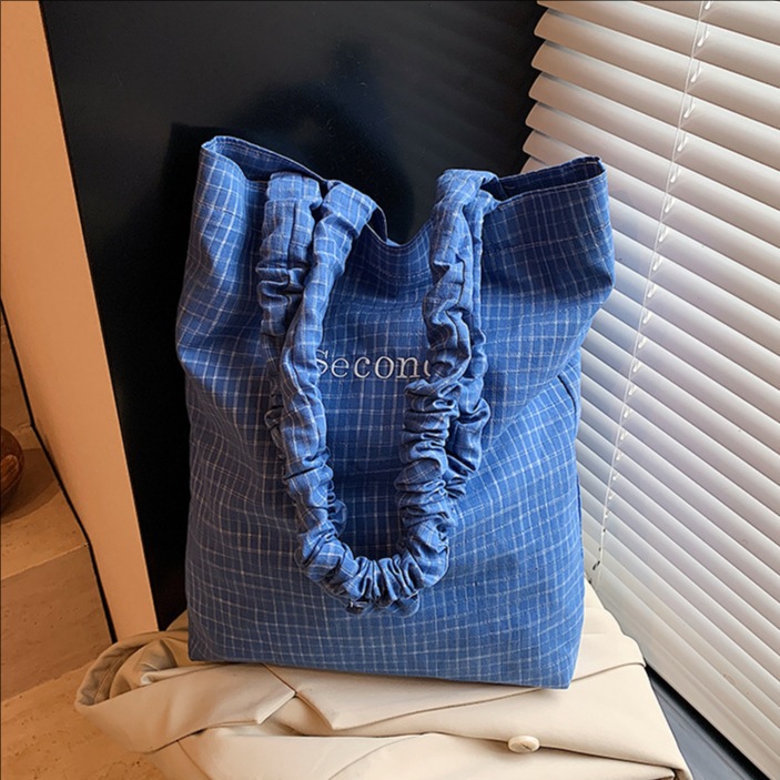 Korean sweet and simple canvas bucket bag for women, new Spring/Summer 2025 fashionable and versatile checkered large-capacity single-shoulder bag full figure