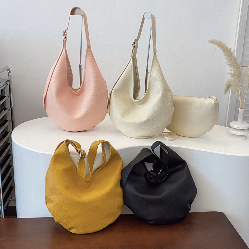 Commuting versatile bucket bag, crossbody bag, Korean style lychee pattern fashionable hand-held women's bag, simple magnetic buckle bag Application Scenario