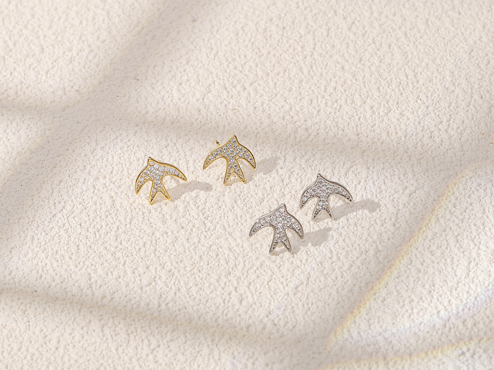 Xuhui exquisite and light luxury copper plated with real gold and zircon 925 silver needle swallow fashionable and elegant stud earrings Item Picture