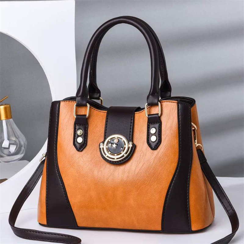 The 2024 new color contrast retro leather-like, stylish large-capacity single-shoulder crossbody women's bag, a cross-border European and American style large bag details Picture