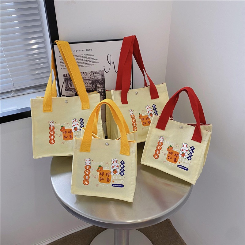 2024 New single-shoulder crossbody cute little rabbit hand-held bento bag, student canvas hand-held supplementary class fresh and sweet bag details Picture