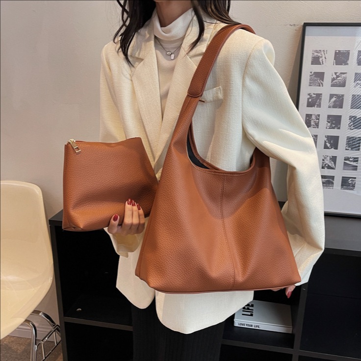 Retro and fashionable lychee pattern underarm bucket bag for women 2025 new style simple mother and child casual large capacity single-shoulder bag full figure
