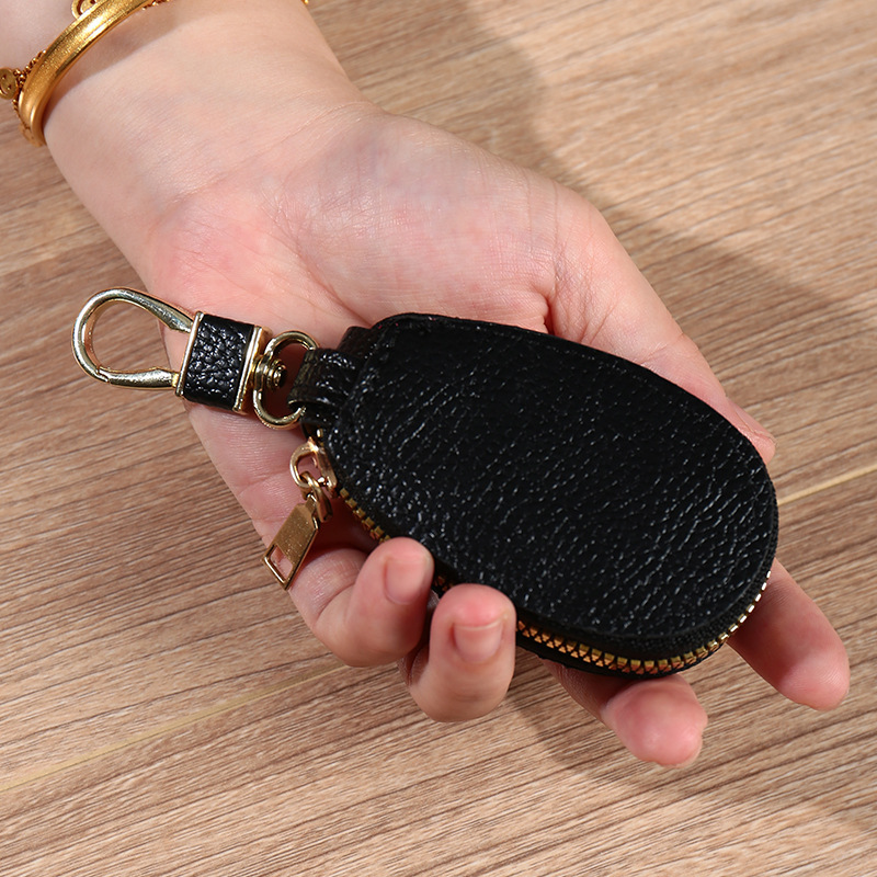 Mini car key case, universal car key storage case for both men and women, creative, fashionable and simple hanging decoration keychain Application Scenario