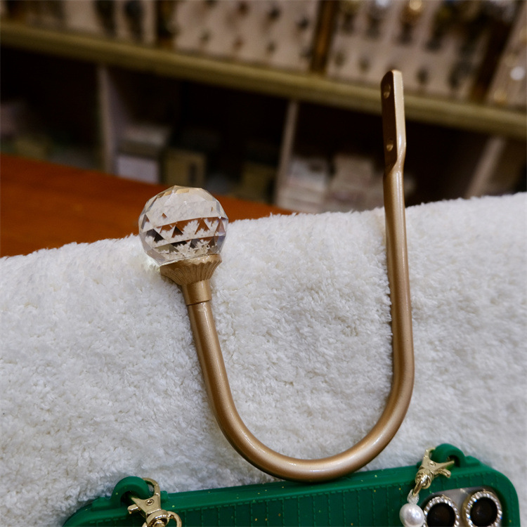 【 Yonghao Hardware 】 Factory direct cross-border supply of new small curved hooks, crystal curtain hooks and wall hooks details Picture