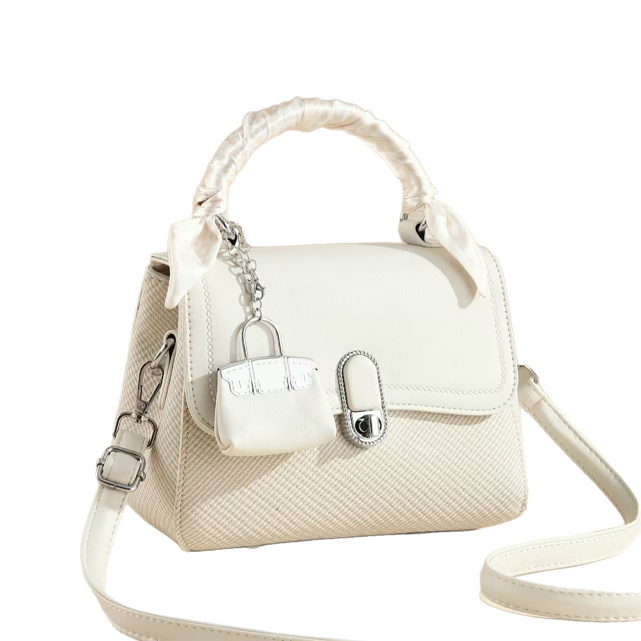 The new 2025 cross-border women's handbag is simple and fashionable with a lock buckle. It is a versatile and elegant large-capacity crossbody bag Item Picture