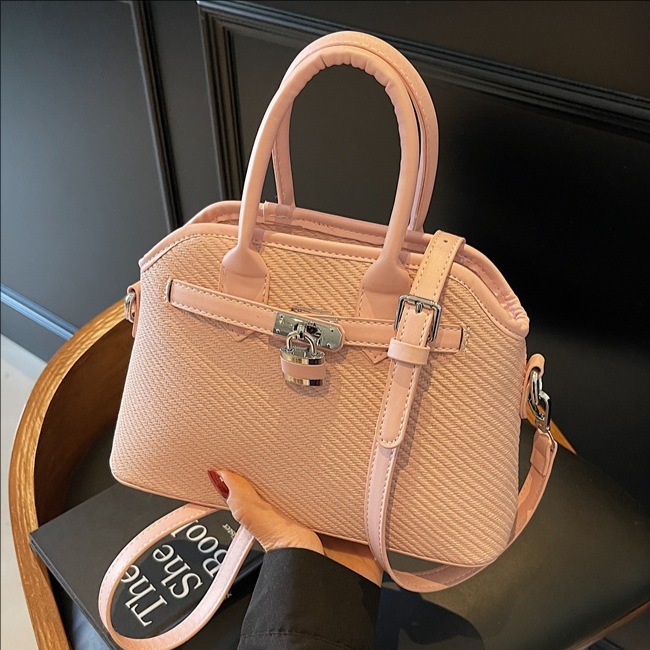 Cross-border niche and versatile casual hand-held bucket bag for women 2025 new retro and simple striped single-shoulder crossbody bag full figure