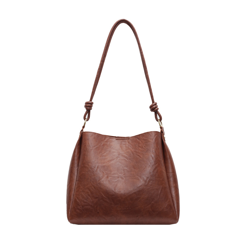 This year, the popular bags for women are the 2024 new retro and fashionable single-shoulder bag with a simple texture and versatile bucket bag Item Picture
