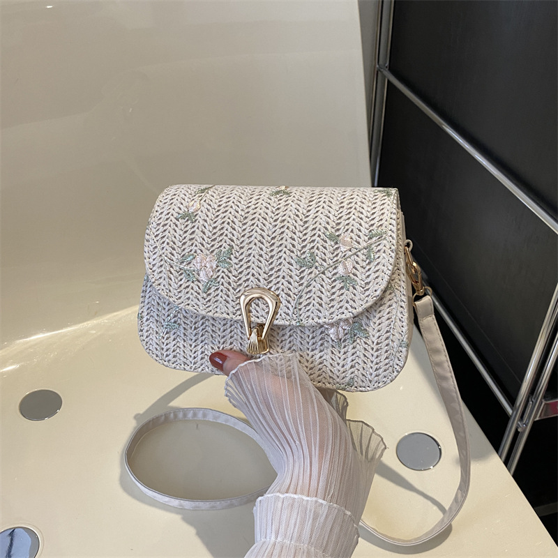 Spring and Summer straw woven bag for women 2024 New style, fresh and delicate lace flower woven saddle bag, versatile single-shoulder crossbody bag full figure